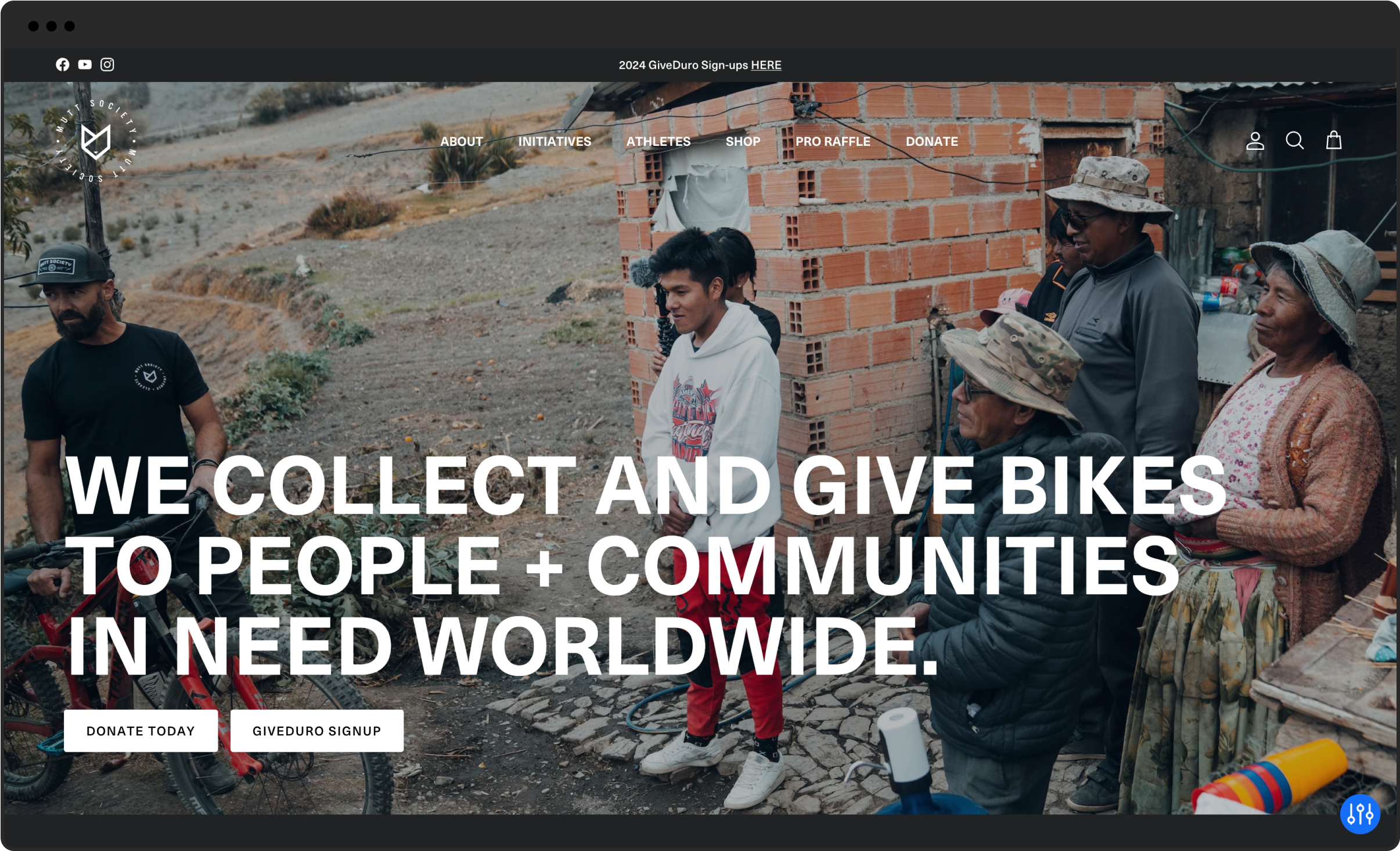 Mutt Society desktop sized website reading "We collect and give bikes to people + communities in need worldwide."