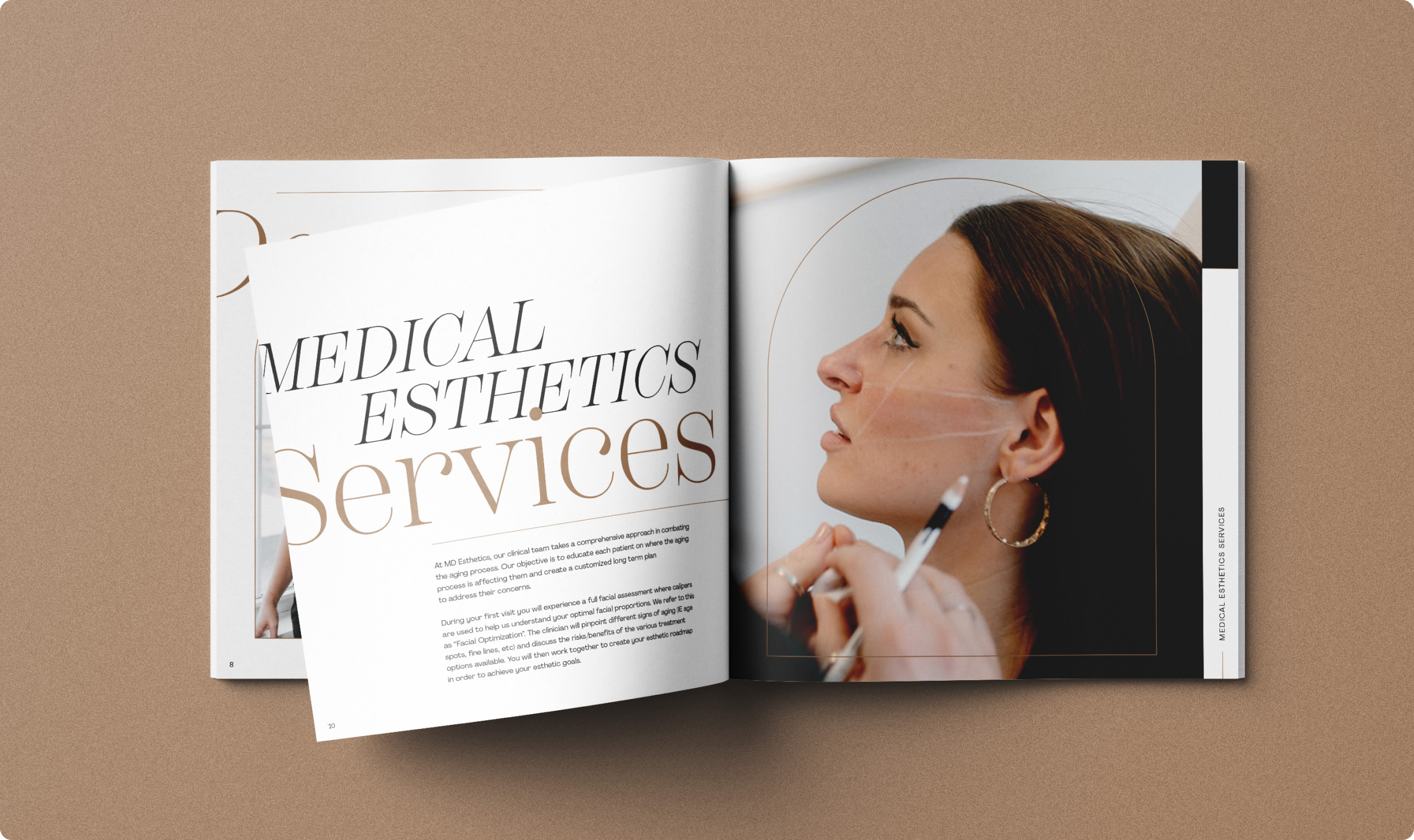 MD Esthetics printed book's "Services" page mid-folding