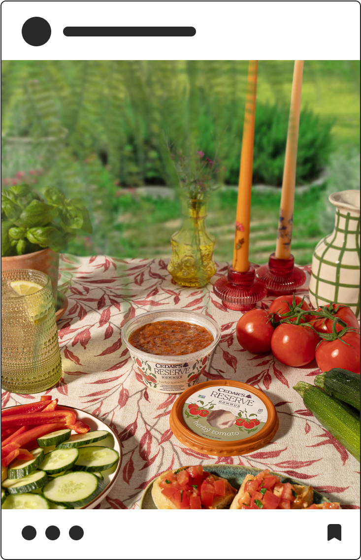Social media post photograph of Cedar's Reserve Hommus at a picnic